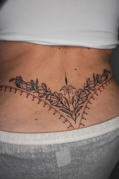 Women’s Henna Lower Back Tattoo