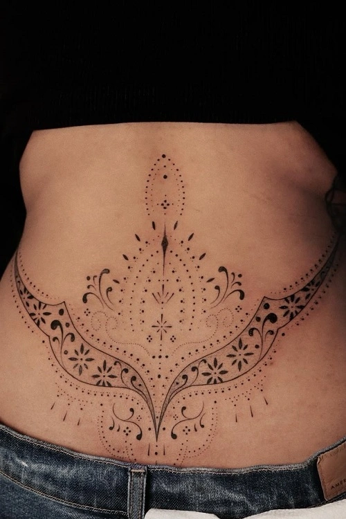 Women’s Henna Lower Back Tattoo