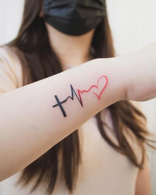 Women's Heart and Cross Tattoo