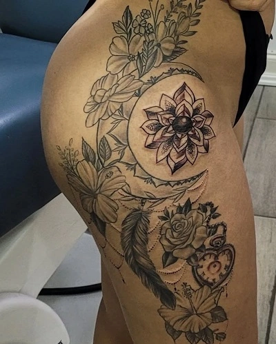 Feather Thigh Tattoos for Women
