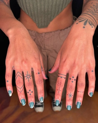 Star Finger Tattoos for Women