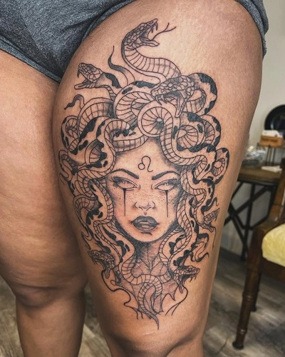 Women's Medusa Thigh Tattoo