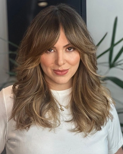 Feathered Layers with Curtain Bangs