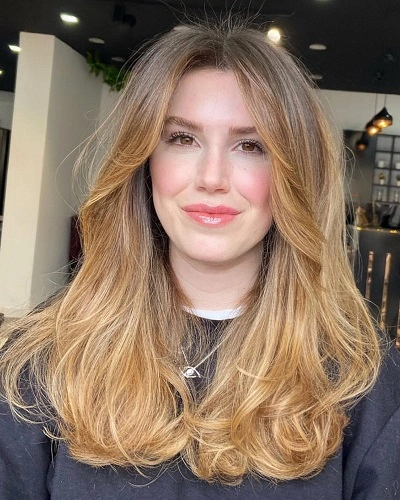 Feathered Layers with Curtain Bangs