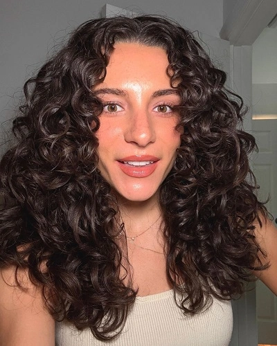 Layered Curls with Center Part
