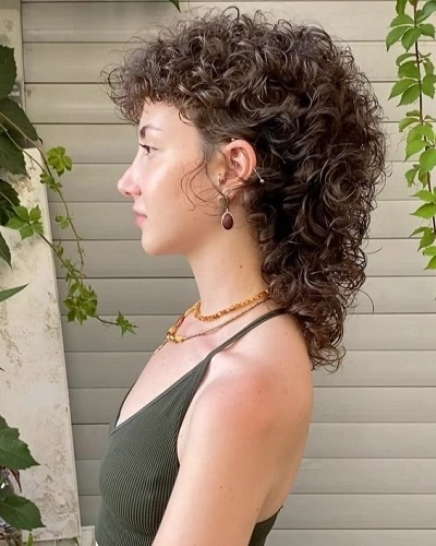 Modern Curly Mullet Woman