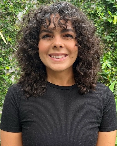 Shoulder Length Curly Cut with Bangs