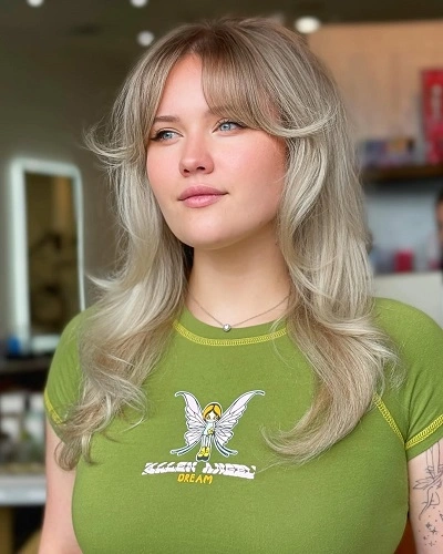 Butterfly Haircut with Bangs