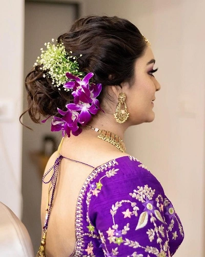 Messy Bun with Loose Strands
