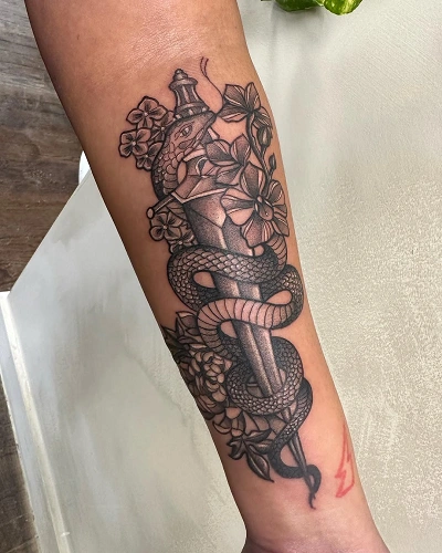 Snake with Floral Elements Tattoos for Women